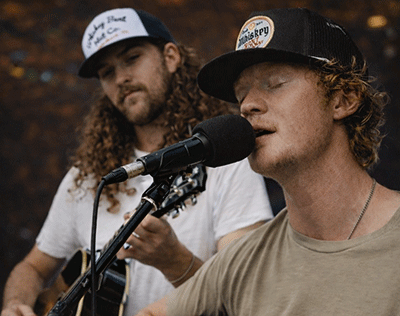 Press photo of Kyle Horton and Christian Smith